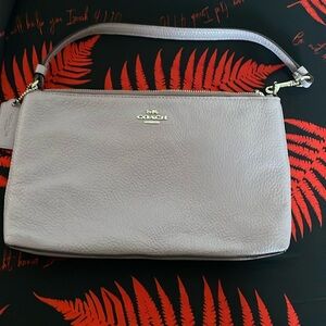 Purple shoulder coach purse